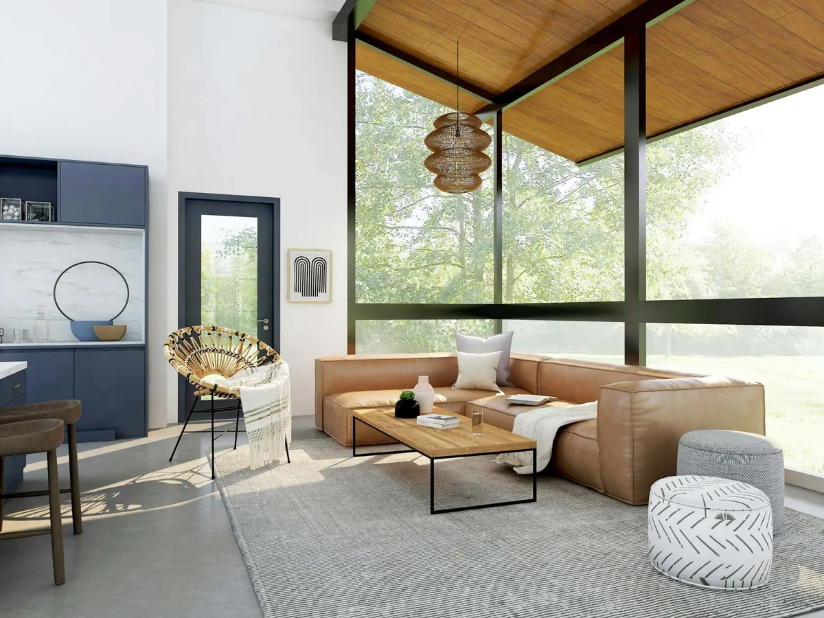 A sunlit living room with floor-to-ceiling glass